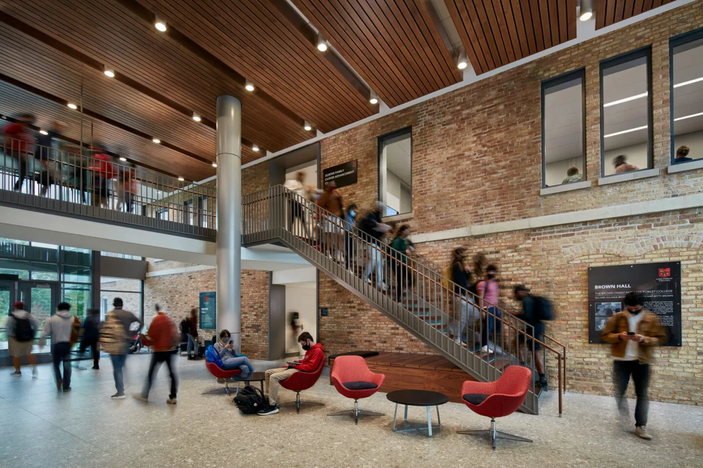 Shared glass entry at SCB's Brown Hall. Architecture. Campus Environments. Learning Environments.